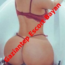 Escort advertisement: woman in red lingerie posing in a bathtub with a red diagonal overlay text Gaziantep Escort Bayan.