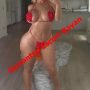 Woman in a red bikini posing in a modern living room, with bold red text 'Gaziantep Escort Bayan' across the image. Woman in a red bikini posing in a modern living room, with bold red text 'Gaziantep Escort Bayan' across the image.